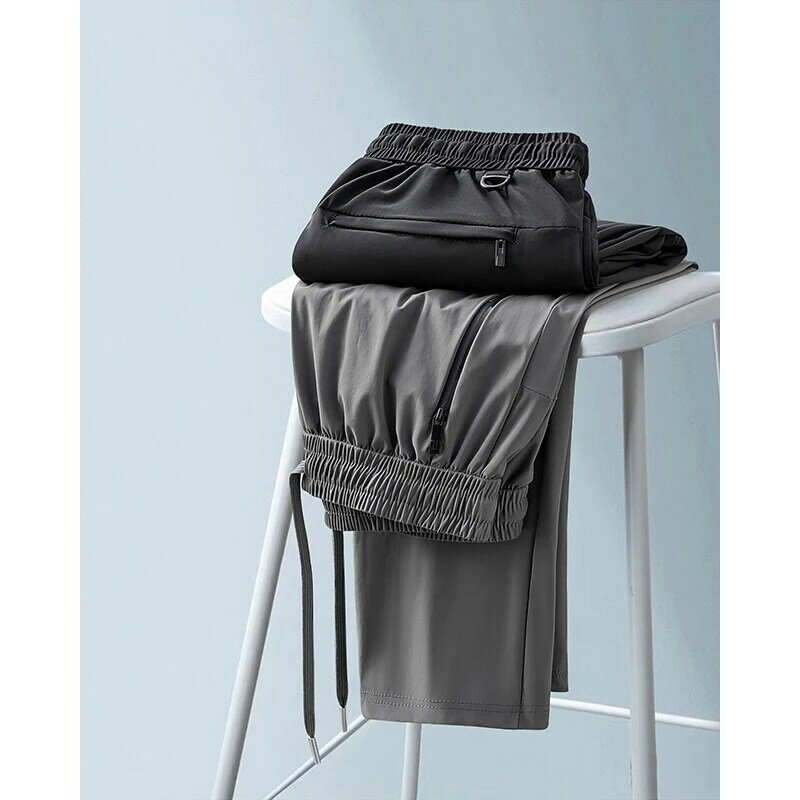 Pantalones de chándal elásticos de seda de hielo para hombre, pantalón informal con bolsillos y cremallera, talla grande 8xl, 6xl, Verano