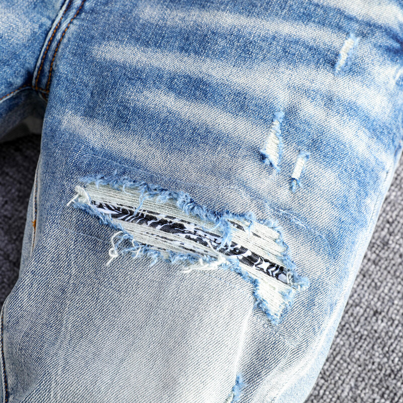 Jeans da uomo di alta moda di strada retrò lavati blu elasticizzati Skinny Fit Jeans strappati da uomo Patched Designer Hip Hop pantaloni di marca Hombre