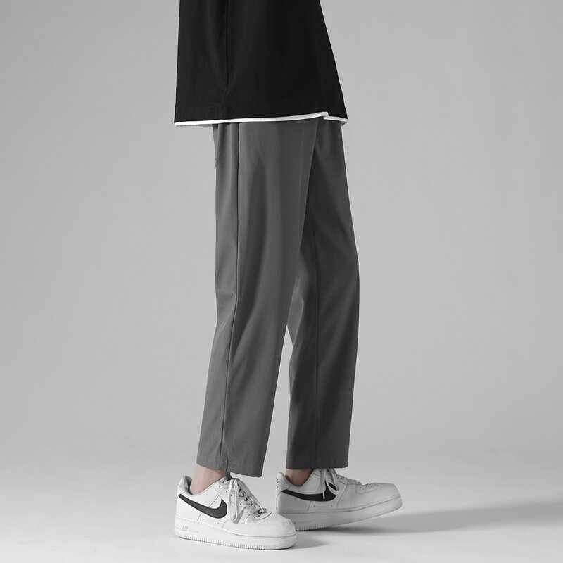 Mężczyźni z szerokimi nogawkami przycięte spodnie 2023 nowy casualowa lekka ciężar spodnie do biegania Streetwear na zimno, czując się komfortowo majtki domowe mężczyzna 5XL