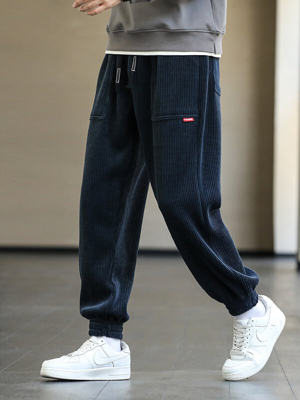 2022 nowa jesienno-zimowa sztruksowe spodnie dresowe męskie Baggy biegaczy moda Streetwear luźne dorywczo spodnie Harem Plus rozmiar 8XL