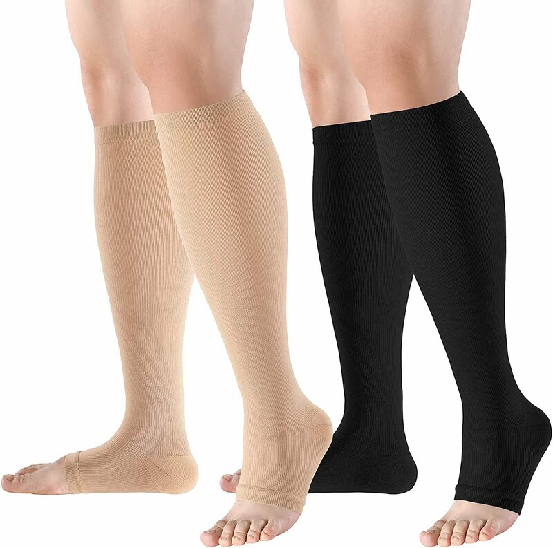 Une paire de chaussettes médicales élastiques à compression pour femme, manches mollet, enveloppes de pression à 3 niveaux, sport, volley-ball, course à pied