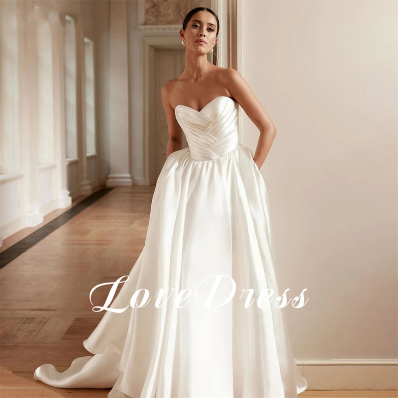 Love Charming Sweetheart pleated Wedding Dress With Bow A-Line Sleeveless Backless Lace Up Floor Length Ruched Sexy Bridal Gowns