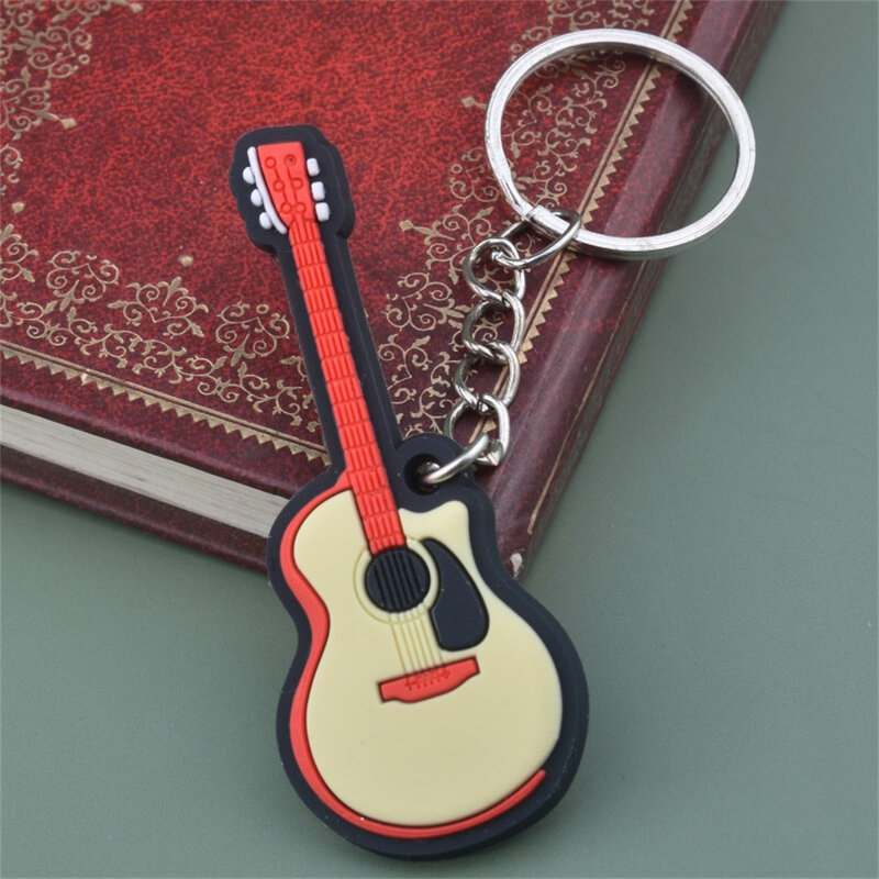 Porte-clés en silicone JESaxophone pour hommes et femmes, porte-clés de piano, pendentif de sac, porte-clés de voiture, cadeau d'amoureux de la musique, mignon