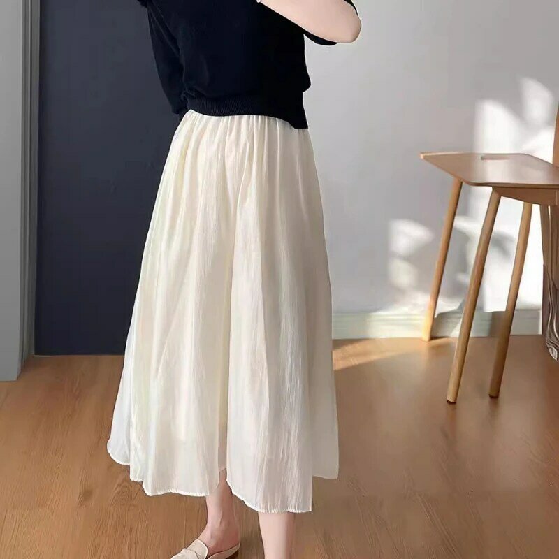 Kobieca długa spódnica damska w stylu letnim w stylu Vintage z wysokim stanem elastyczna luźny, biały spódnica trzy czwarte szkolna na co dzień spódnice dla pań Q876