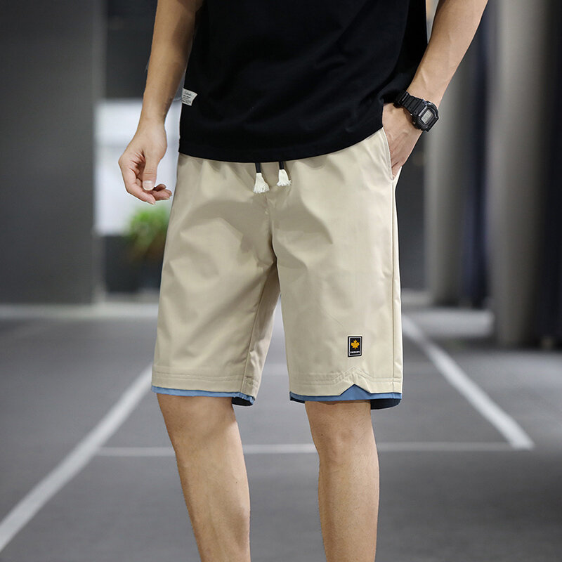 2023 verão calções masculinos esportes de cinco pontos calças soltas casual praia calças cor sólida tendência exterior wear tamanho grande shorts 8xl