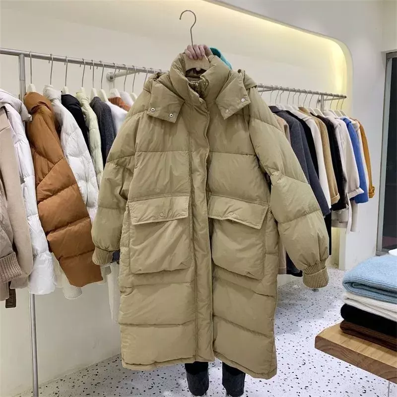Jaket Down wanita, mantel Musim Dingin versi panjang sedang longgar parka hangat bertudung serbaguna 2024