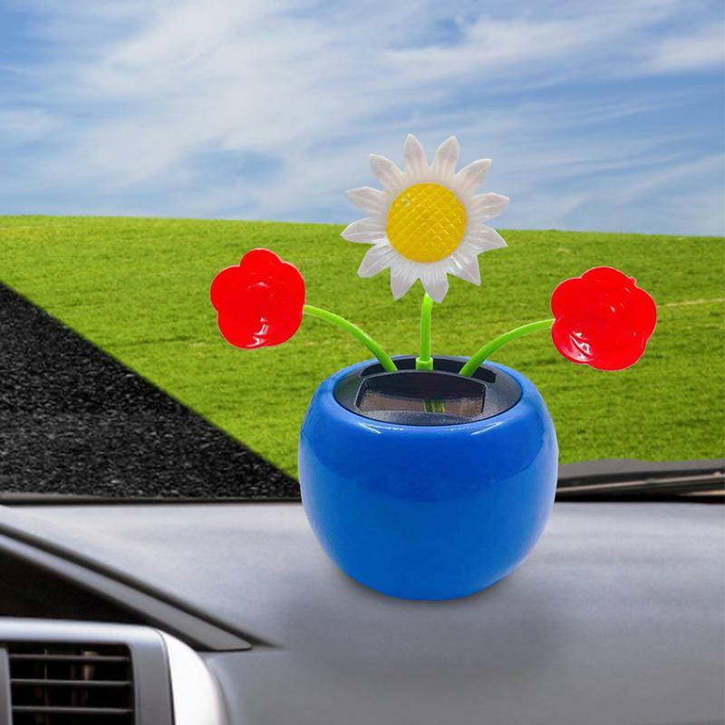 รถของเล่นพลังงานแสงอาทิตย์เต้นรำรูปดอกทานตะวัน ABS ที่สร้างสรรค์ของเล่นขับเคลื่อนพลังงานแสงอาทิตย์โต๊ะทำงานอัตโนมัติเครื่องประดับแผงหน้าปัดรถยนต์ตกแต่งภายในรถยนต์