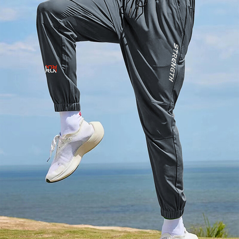 2024 nowych męskie spodnie dresowe w stylu Casual mężczyzn/kobiet. Sznurek spodnie do biegania Fitness spodnie do joggingu oddychające spodnie Fitness