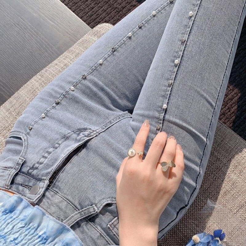 Primavera e autunno 2024 delle donne a vita alta nuovi Jeans svasati con borchie spaccate versatili in stile Lolita giapponese