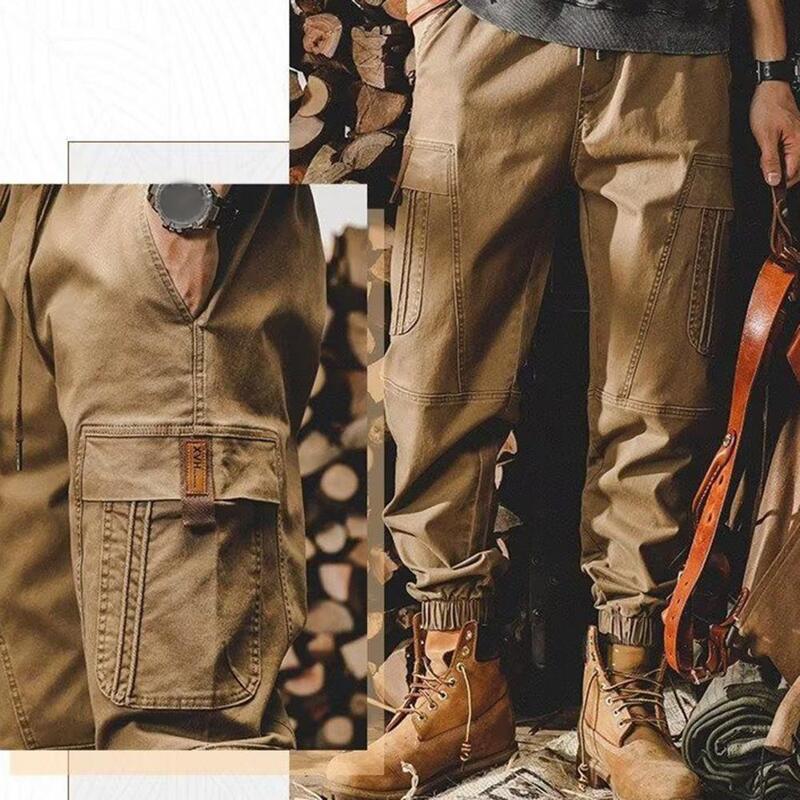 Pantalones Cargo de estilo Hip Hop para hombre, pantalones con múltiples bolsillos, cintura elástica, diseño con bandas en el tobillo, High Street