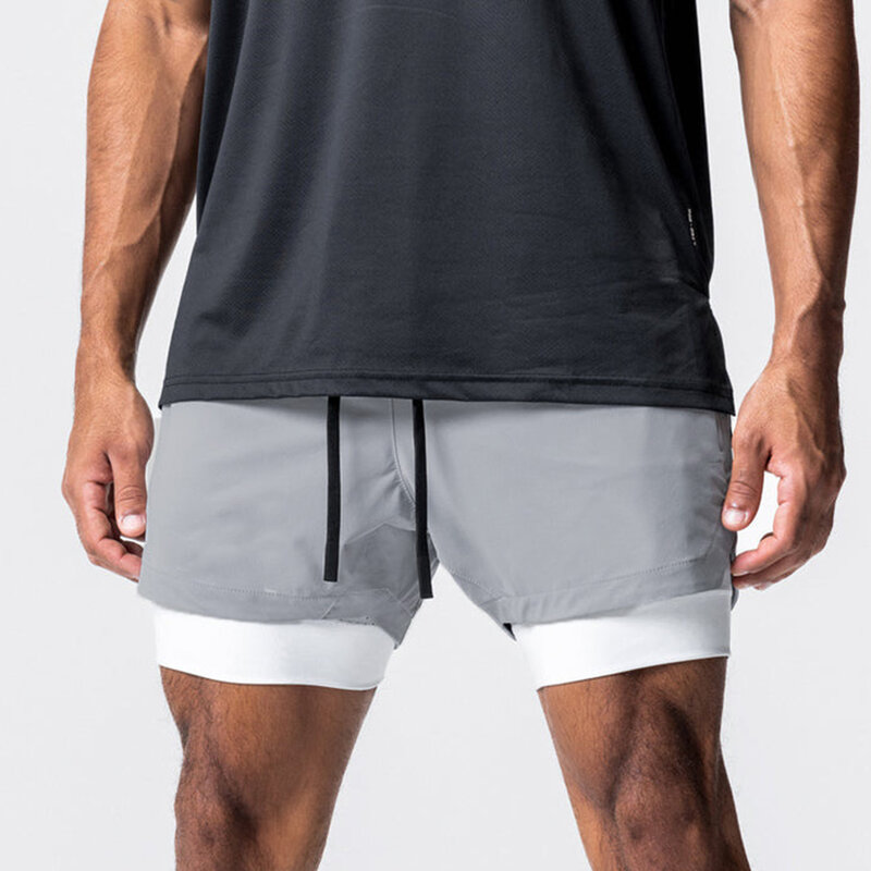 Celana pendek olahraga, celana pendek latihan musim panas 2 In1 Fitness Jogging tidak elastis cepat kering warna Solid olahraga baru