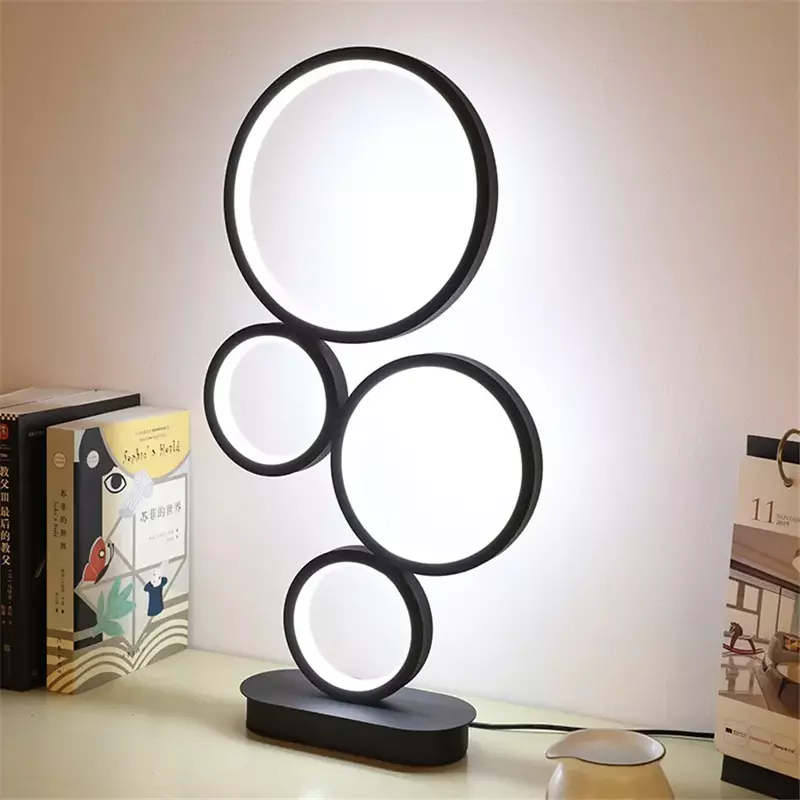 Moderne dimmbare LED Augenschutz Tisch lampe Wohnzimmer Wohnkultur Runde einzigartiges Design vier Kreise Schlafzimmer Nachttisch Licht