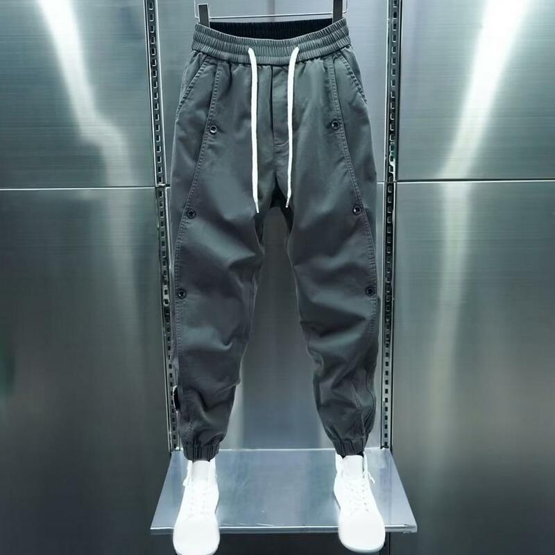 Tuta da uomo con coulisse elastico in vita tinta unita Multi-tasca irregolare Street Sports pantaloni Outdoor