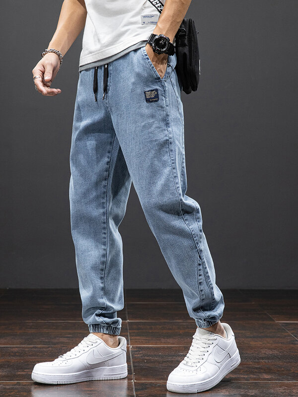 Primavera estate nero blu Cargo Jeans uomo Streetwear Denim Jogger pantaloni uomo Baggy Harem Jean pantaloni Plus Size 6XL 7XL 8XL