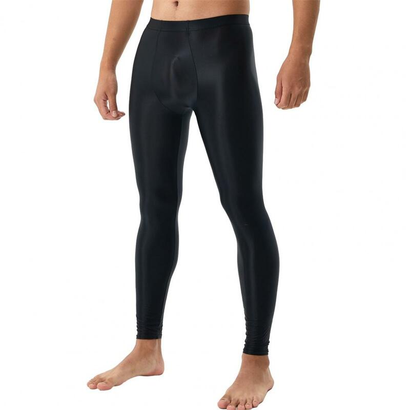 Jednolity kolor legginsy męskie jedwabiście gładkie dopasowane obcisłe spodnie z wypukłą z gąbką uwypuklającą wysoka elastyczność miękka oddychająca tkanina do połowy