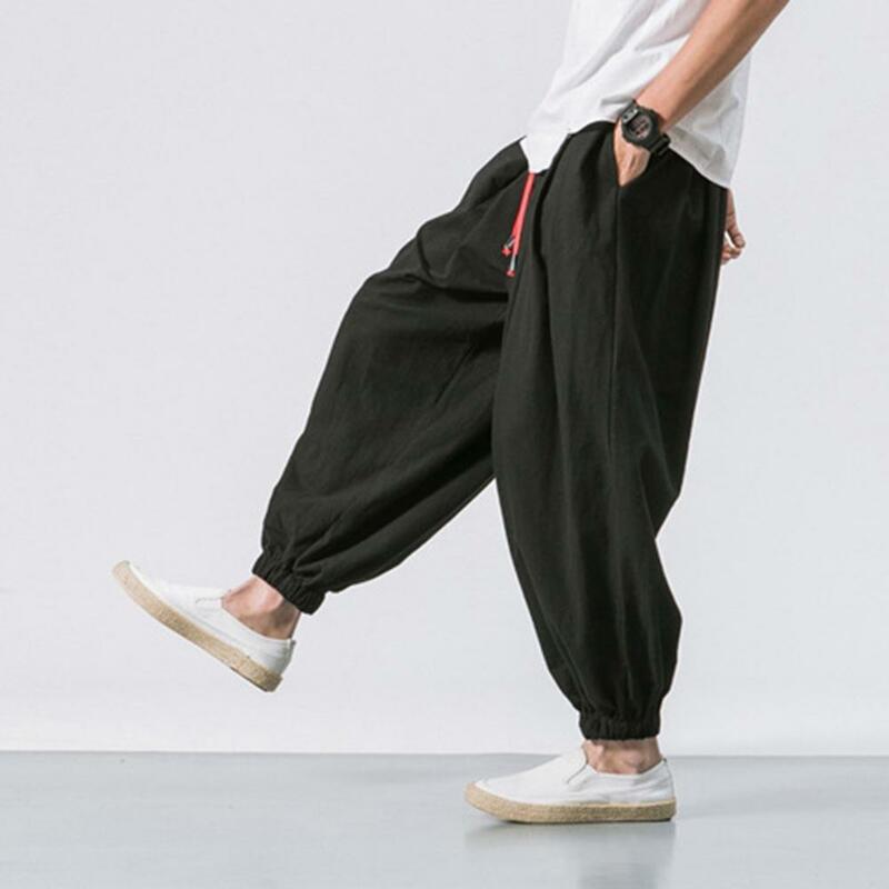 Pantaloni estivi Harem Streetwear pantaloni sportivi da uomo tinta unita elastico in vita con coulisse allentata tasche Hip Hop pantaloni larghi Streetwear