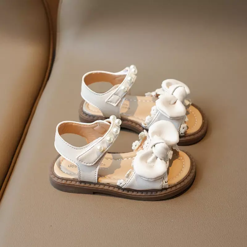 Sandalias elegantes con pajarita para niña, zapatos planos de vestir de princesa, informales, de Punta abierta, con perlas, para caminar, Verano