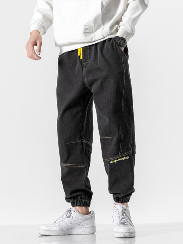 Wiosenne letnie sznurki dżinsy Cargo męskie czarne spodnie jeansowe workowate spodnie haremki Casual rozciągnięte spodnie Jean Plus rozmiar 8XL
