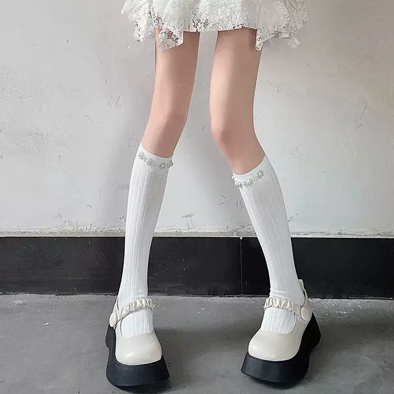 Kaus kaki panjang hitam putih stoking Lolita kaus kaki tinggi lutut mutiara anak perempuan warna polos wanita JK kaus kaki lutut gaya Jepang stoking Sox