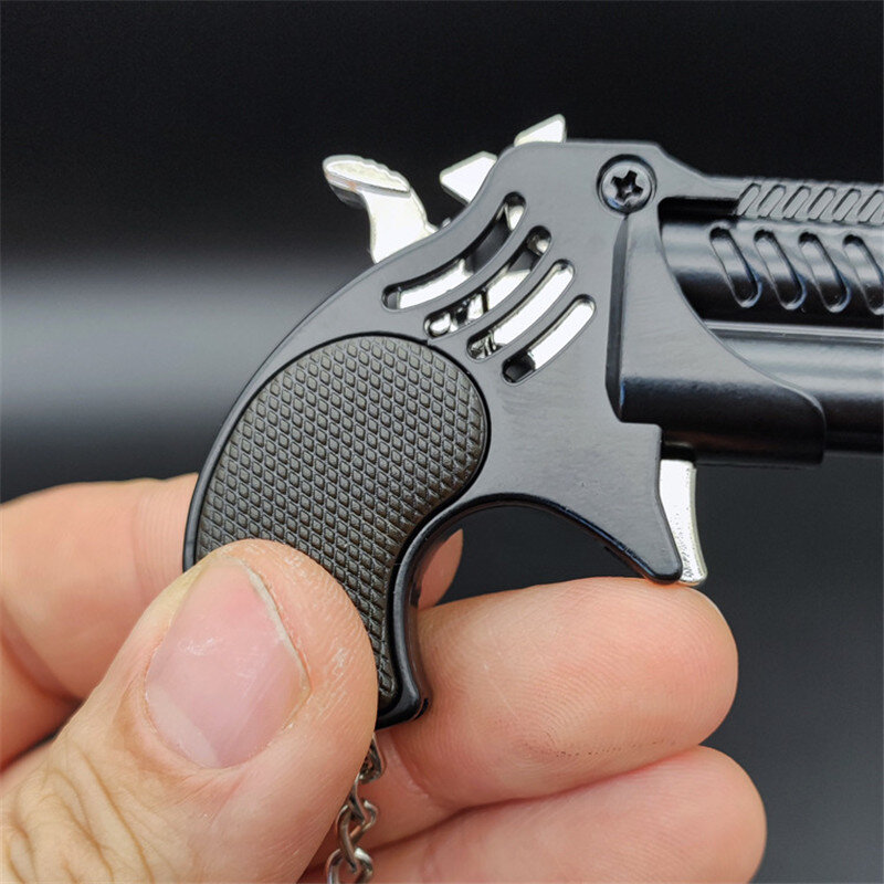 Mini pistola de banda de goma plegable, modelo de aleación, colección de pistola, juguete, regalo, bala, 6 disparos