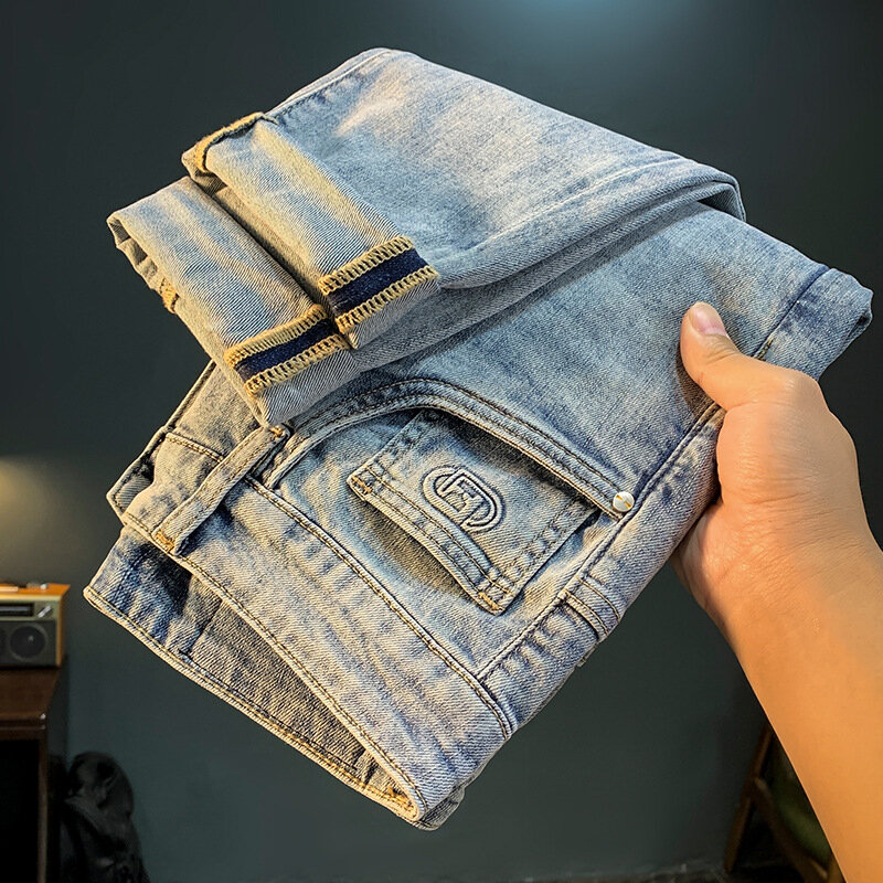 High-End Betaalbare Luxe Jeans Herenmode Persoonlijkheid Reliëf Taps Toelopende Mode Elastisch 2024 Nieuwe Veelzijdige Cropped Broek