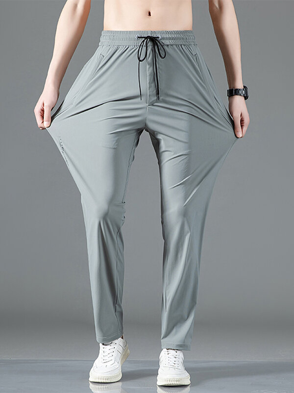 Pantalon de survêtement à poches zippées pour hommes, survêtement d'été respirant, en Nylon extensible à séchage rapide, décontracté, grande taille, pantalon de Sport droit 8XL