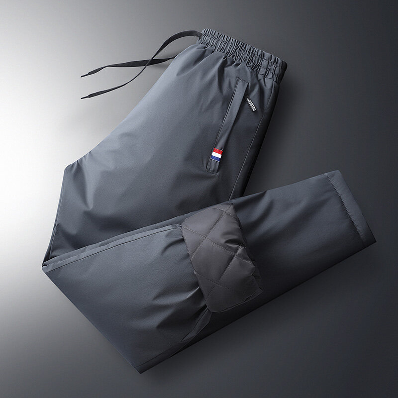 Celana pinggang elastis pria, bawahan tahan air dan hangat ukuran besar musim gugur 7Xl