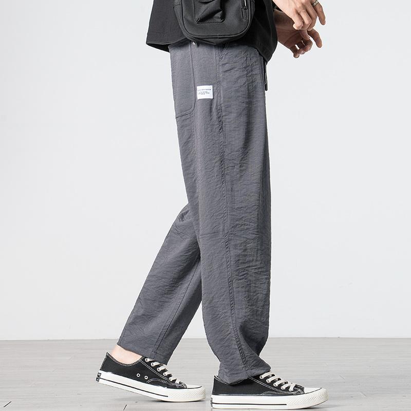 Celana kasual pria, musim panas 2024 baru, kain perca, menunggu elastis, tali serut, Saku, warna Solid, nyaman dan serbaguna