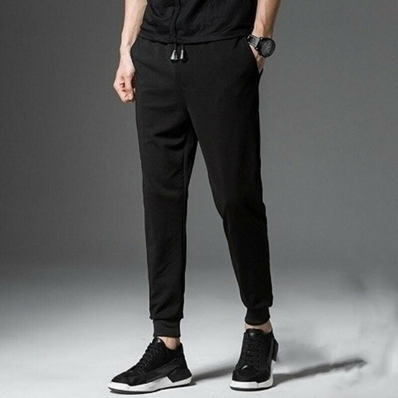 Męskie na co dzień wszechstronne, jednolite, sportowe spodnie typu Casual ze sznurkiem elastyczne w talii spodnie dresowe dla joggerów luźne długie spodnie w rozmiarze Plus Size