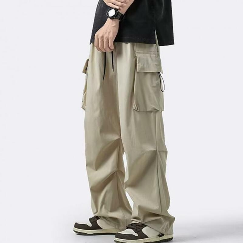 Pantalones de pierna recta para hombre, pantalones Cargo multibolsillos con detalle de cordón, cintura elástica para exteriores, Color sólido