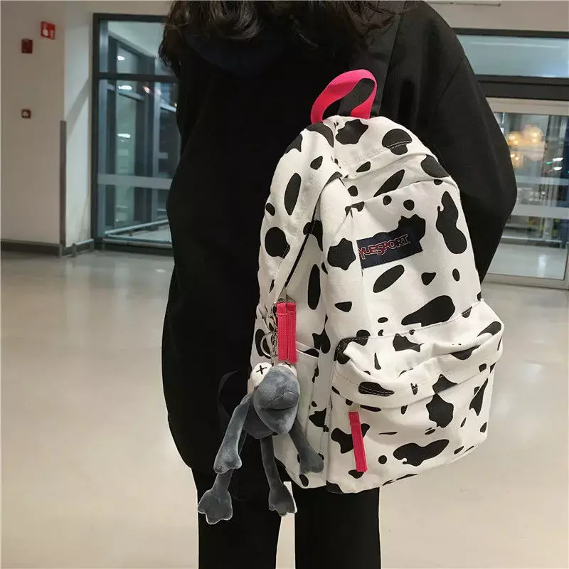 Mochila con estampado de leopardo para mujer, mochilas escolares con diseño de animales divertidos para niñas adolescentes, bolsos Kawaii con estampado de vaca blanca