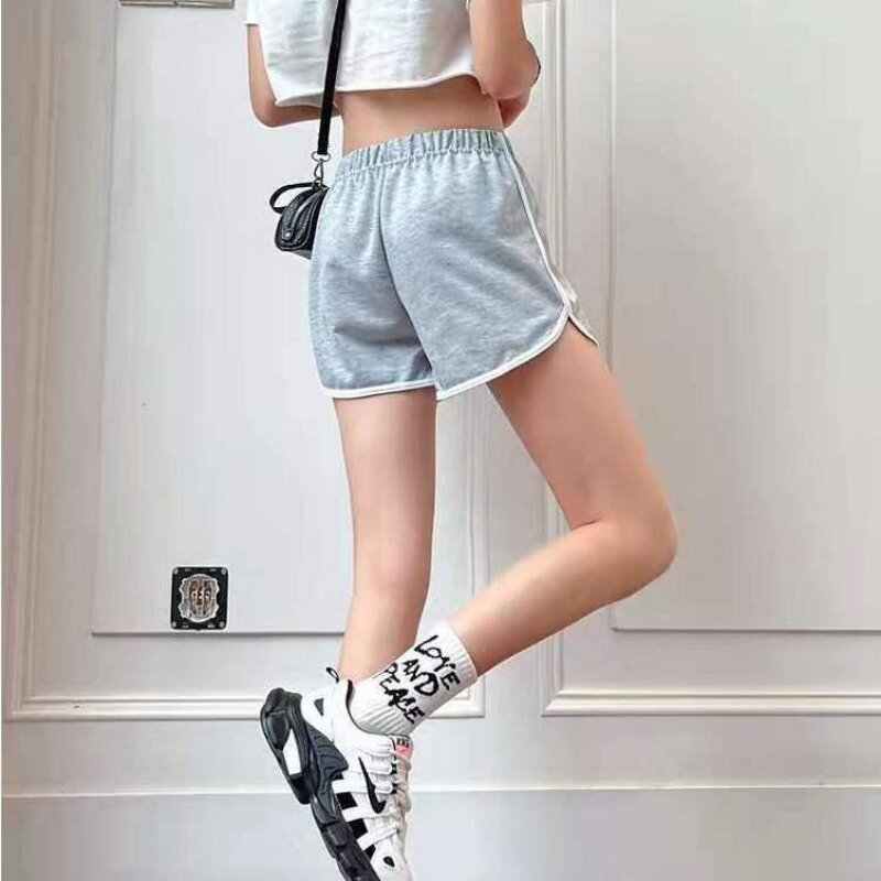 Celana pendek olahraga wanita, celana olahraga rumah kaki lebar edisi Korea kasual dengan tepi warna kontras musim panas