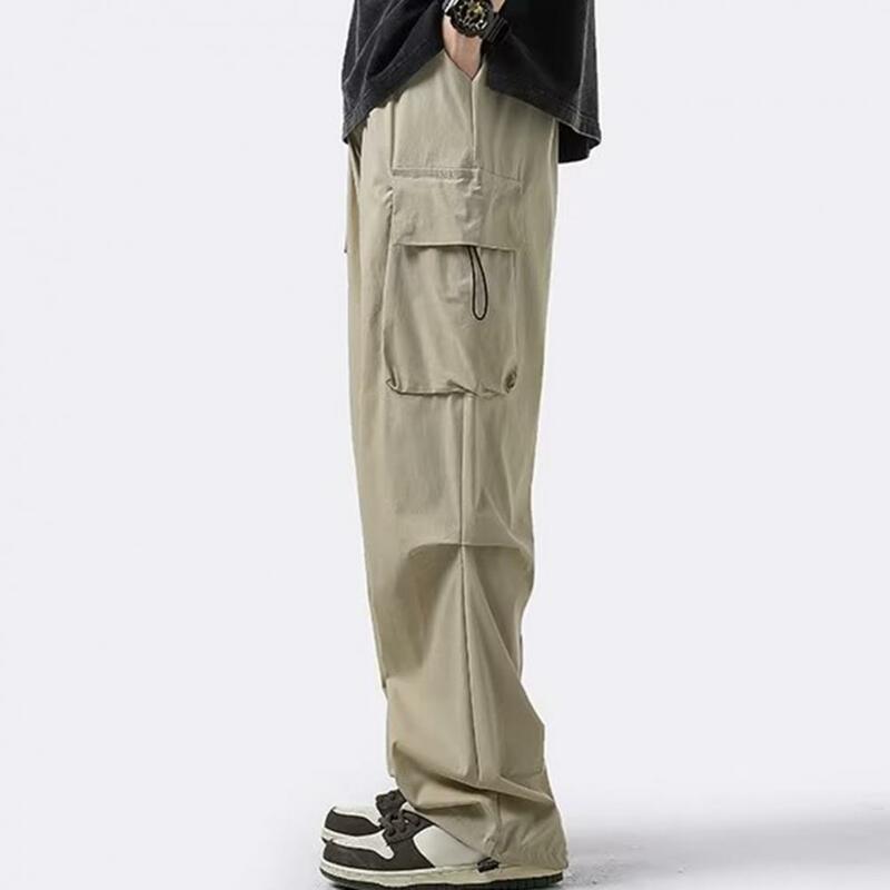 Pantalones de pierna recta para hombre, pantalones Cargo multibolsillos con detalle de cordón, cintura elástica para exteriores, Color sólido