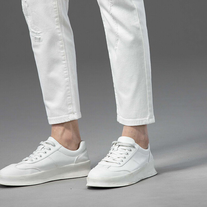 Męskie elastyczne dżinsy slim-fit Business Casual styl klasyczny moda elastyczne bawełniane spodnie dżinsowe męskie czyste białe spodnie kowbojskie