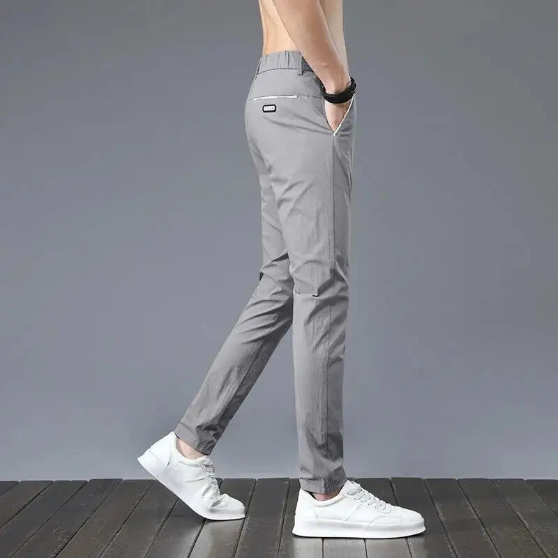 Pantalones informales coreanos de cintura media para hombre, pantalones empalmados con bolsillos, simplicidad de oficina, Verano