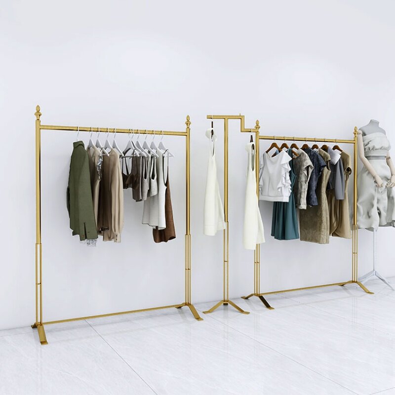 Espositore e Rack per abbigliamento elettrico in acciaio inossidabile dorato dal Design semplice e personalizzato per negozio di abbigliamento Boutique
