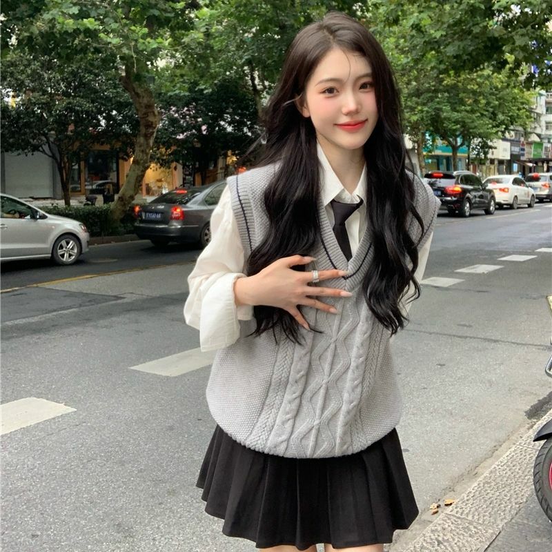 Setelan rompi gaya kuliah wanita, baju rompi rajut leher V + rok lipit Jk sekolah Korea mode Jepang baru musim gugur