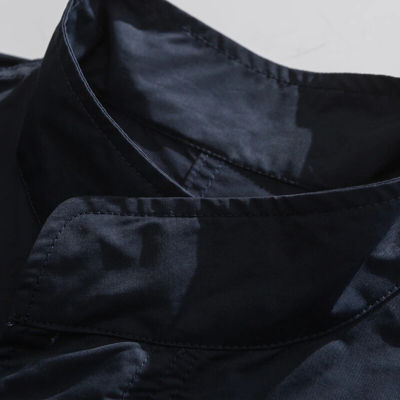 Giacca a vento da uomo primavera all'aperto giapponese Multi tasca colletto alla coreana semplicità Trench solido sciolto giacca con utensili di media lunghezza