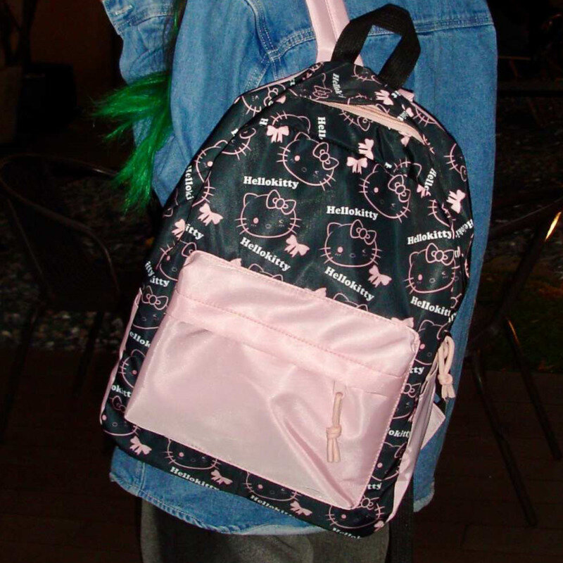 Sanrio tas punggung motif Hello Kitty, tas sekolah kapasitas besar warna hitam dan merah muda kontras Y2k gaya Korea lucu baru