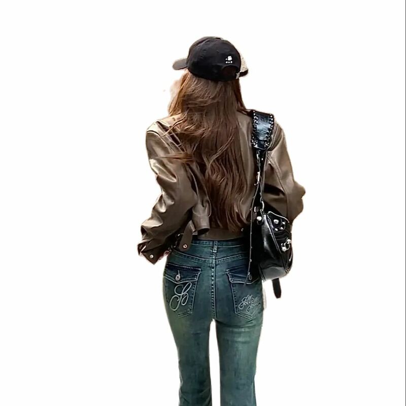 เสื้อแจ็คเก็ตนุ่มหนัง PU สไตล์เกาหลีมีซิปย้อนยุคเสื้อโค้ทสตรีทกันน้ำทรงโอเวอร์ไซส์ลายหัวรถจักรเสื้อโค้ทผู้หญิง