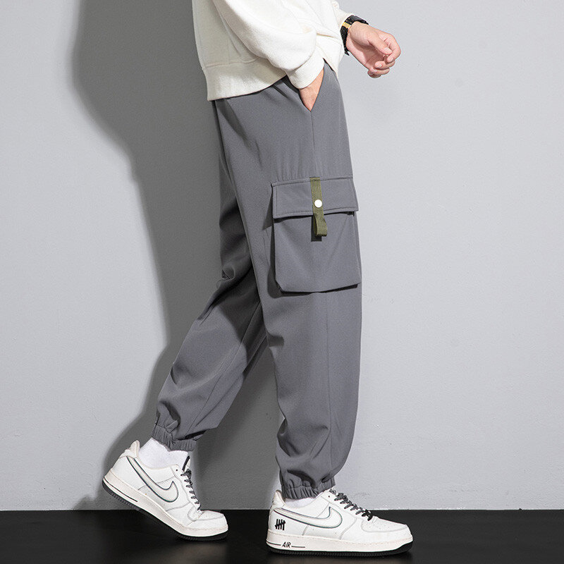 Nowe męskie spodnie Cargo Hip Hop Street boczne kieszenie sportowe spodnie z wąskie spodnie obszyciem męskie codzienne luźne spodnie kombinezony