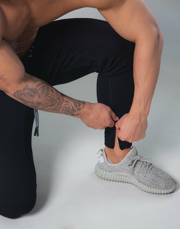 2024 jesienne nowe spodnie bawełniane do biegania na uwięzi sportowe spodnie sportowe męskie trend fitness mężczyzn