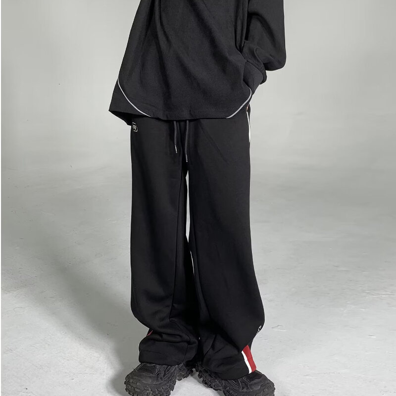 Celana kasual pria Retro Amerika, celana olahraga kasual pria pinggang tinggi kaki lurus longgar mode garis-garis Musim Semi dan Gugur