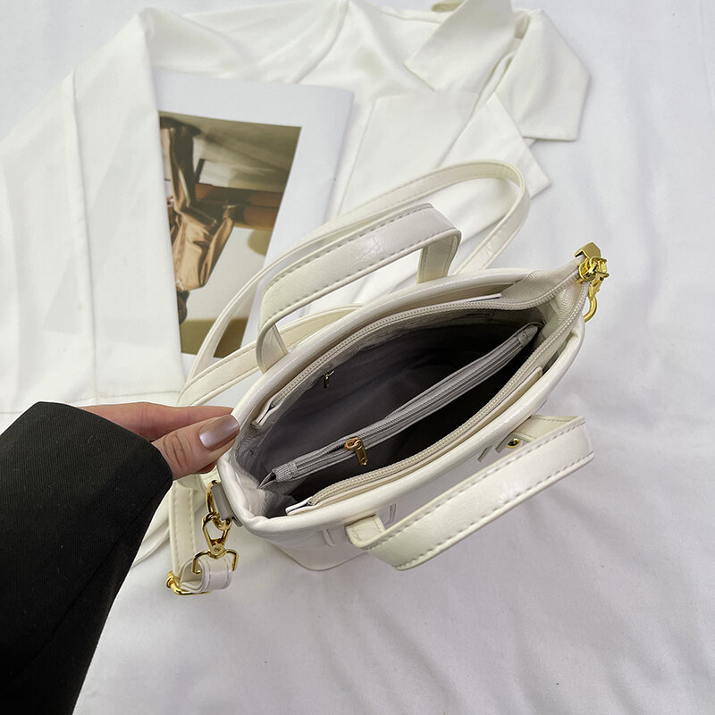 Najwyższej jakości skórzana torebka i torebka damska torebka luksusowy projektant małe wiaderko torba na ramię Crossbody luksusowych srebrnych codzienne kopertówki