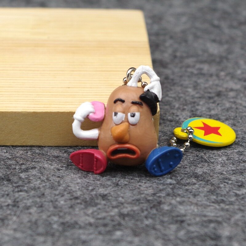 شخصيات ديزني أنيمي السيد البطاطس رئيس بولي كلوريد الفينيل شخصيات لطيف سلسلة المفاتيح قلادة جمع الحلي نموذج لعبة هدايا للأطفال