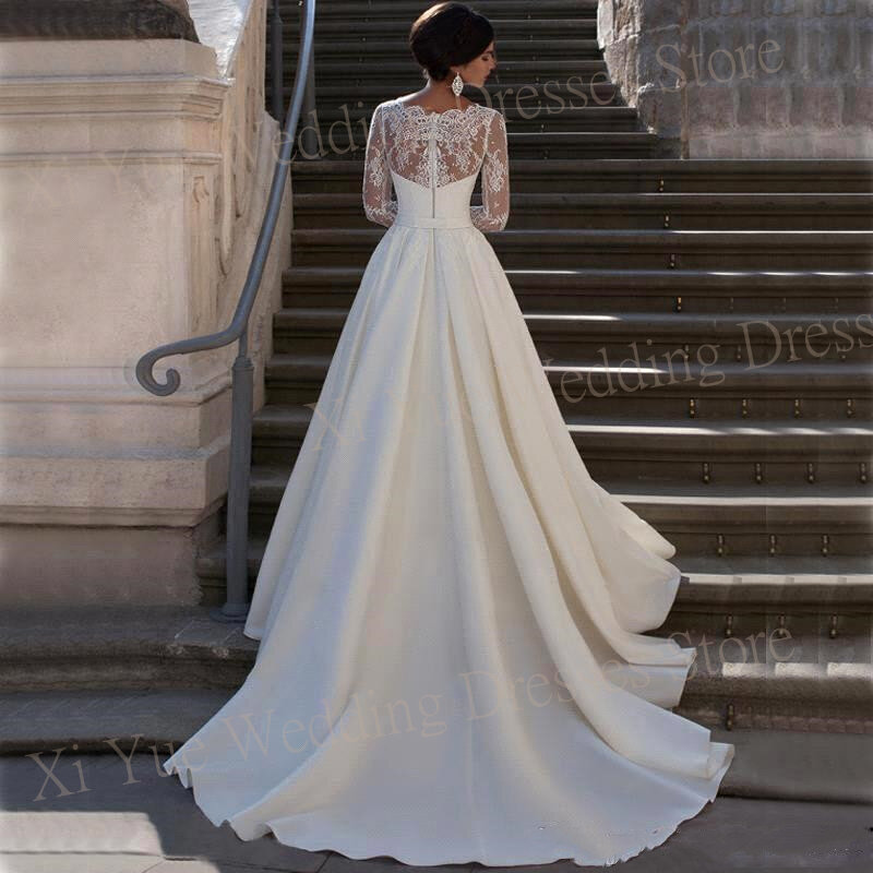 Bescheidene exquisite Brautkleider mit V-Ausschnitt A-Linie Satin Spitze Applikationen Brautkleider mit langen Ärmeln rücken freie Illusion neue Prinzessin