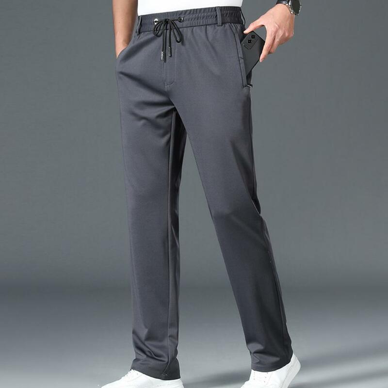 Loose Fit Men Pants Stretchy Men's Casual Pants with Pockets Fast-drying Straight-fit Trousers for Comfortable All-day Wear