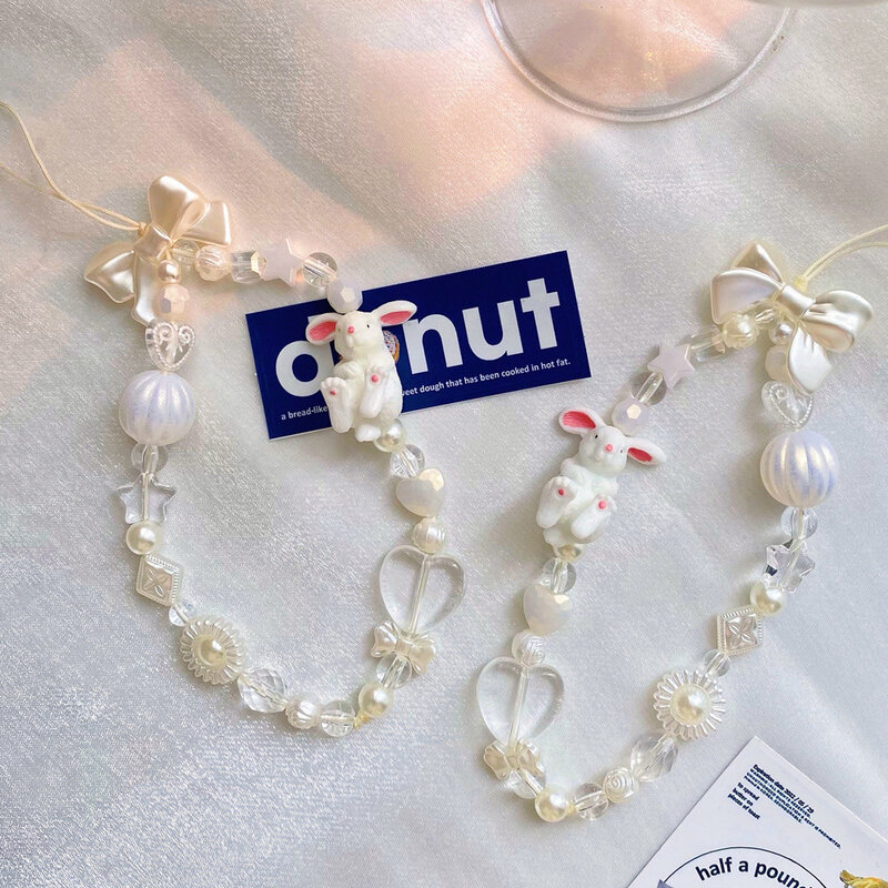 Nova moda charme branco coelho estrela arco corrente do telefone móvel decoração anti-perdido cordão pingente acessórios femininos jóias 2023