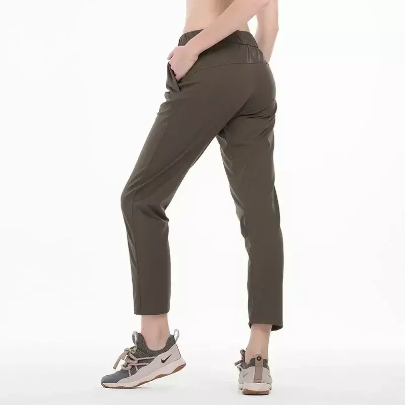 Lemon Women On The Fly Yoga Sport Pants Workout Running Leggings 4-drożny rozciągliwy materiał z bocznymi kieszeniami Outdoor Gym Trousers