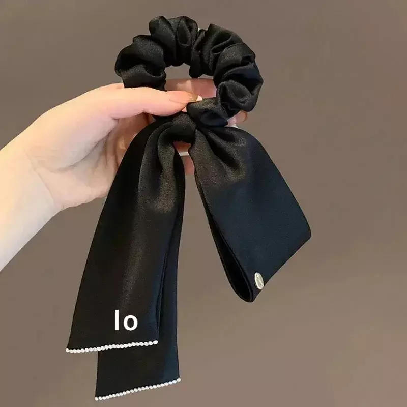 LO Yoga Bow Satin Finish Love Knots Tie Scrunchie Long Flowy Attached Bow Strings Headband for Women Cute Yoga Accessories